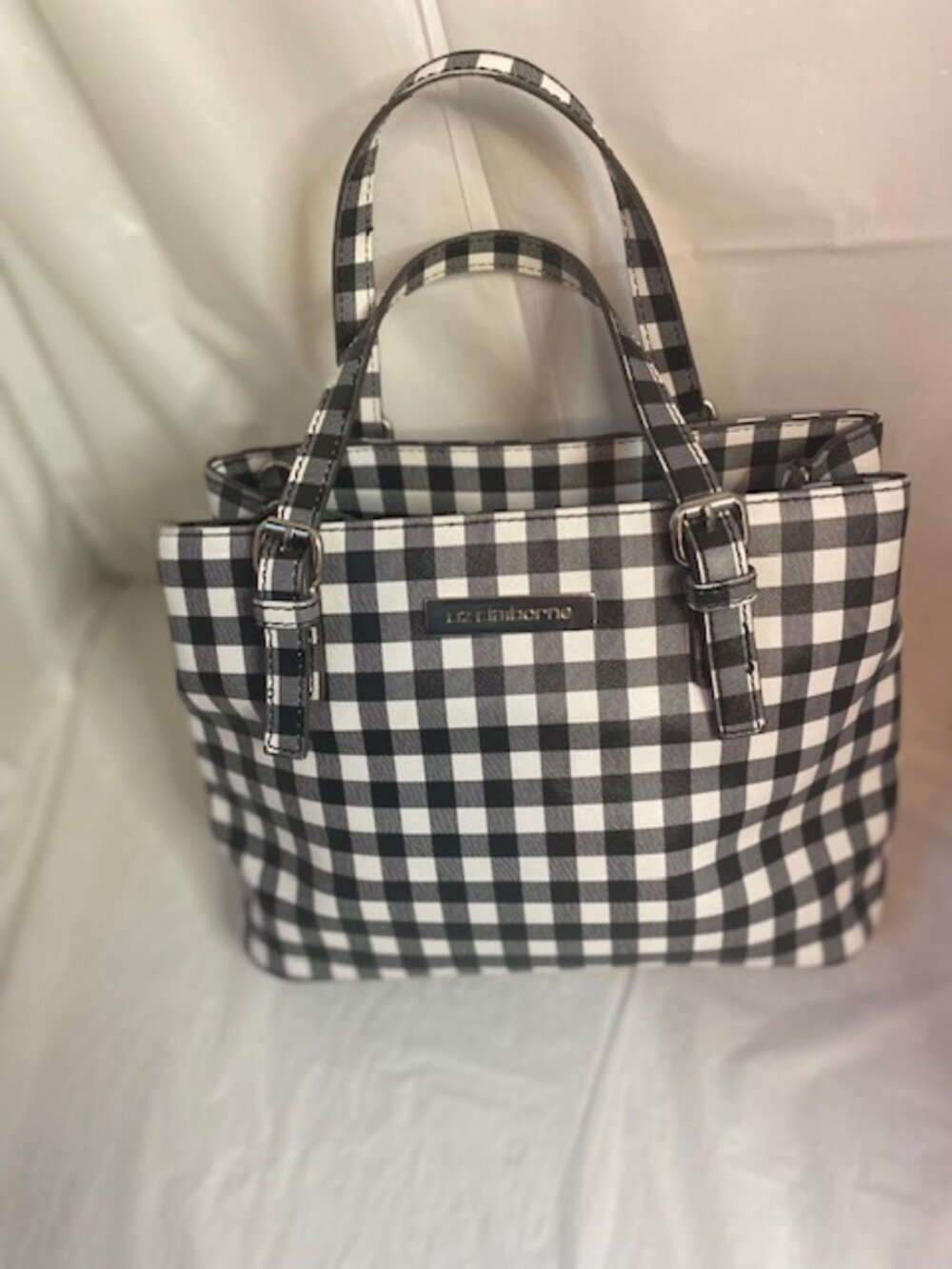 Liz Claiborne black and white gingham print faux leather tote.